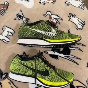 Nike Flyknit Running Shoes in Volt and Black